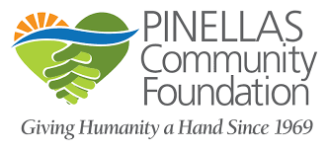 Logo of Pinellas Community Foundation featuring two green hands forming a heart shape, with a sun and wave above. Text reads, "Giving Humanity a Hand Since 1969.